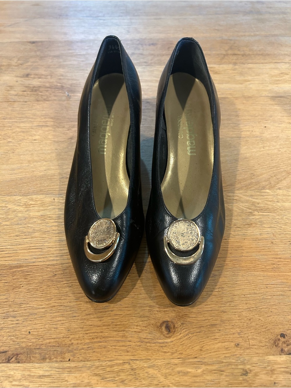 Black Leather Wedge Pumps with Gold Accent